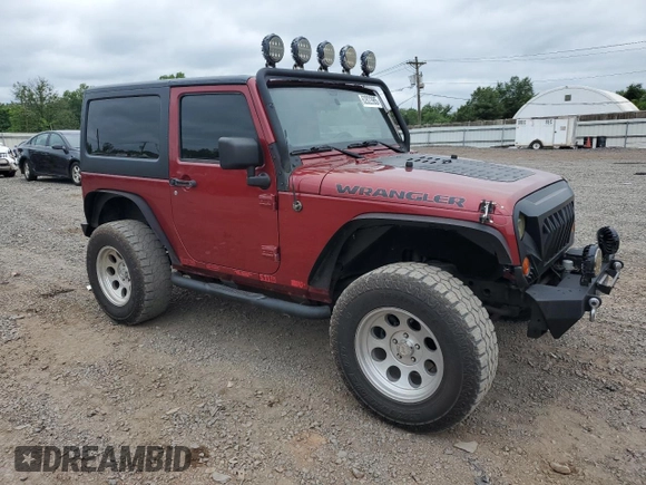 2012 Jeep Wrangler Sport z VIN 1C4AJWAG7CL105511, wystawiony jako Copart lot #62822985 z przebiegiem 137 520 mil mil oraz Czysty tytuł • Clean title. Historia ofert i sprzedaży dostępna na DreamBid. Obrazek 4.