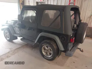1999 Jeep Wrangler SE with VIN 1J4FY29PXXP409455, listed as a IAAI auction lot 42234313 with 56,252 mi miles and . Bid and sale history available at DreamBid. Image 3.