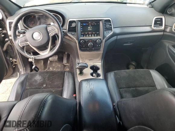 2014 Jeep Grand Cherokee Laredo with VIN 1C4RJFAG4EC486790, listed as a Copart auction lot 55314735 with 143,096 mi miles and Salvage Title. Bid and sale history available at DreamBid. Image 8.