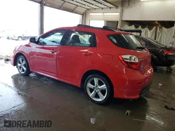 2009 Toyota Matrix S with VIN 2T1KE40E69C012797, listed as a Copart auction lot 62181605 with 174,599 mi miles and Salvage title. Bid and sale history available at DreamBid. Image 2.