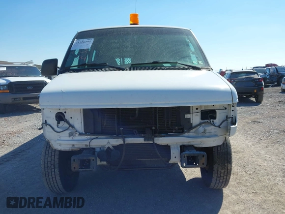 2003 Ford Econoline Cargo Commercial with VIN 1FTNE24L43HB35916, listed as a IAAI auction lot 41526304 with 86,810 mi miles and . Bid and sale history available at carsss.com. Image 12.