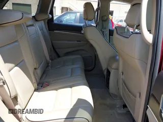2017 Jeep Grand Cherokee Overland with VIN 1C4RJFCTXHC676236, listed as a IAAI auction lot 42164645 with 94,658 mi miles and . Bid and sale history available at DreamBid. Image 8.