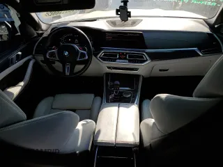 2021 BMW X5 M with VIN 5YMJU0C01M9F10602, listed as a Copart auction lot 65668883 with 23,214 mi miles. Bid and sale history available at carsss.com. Image 8.