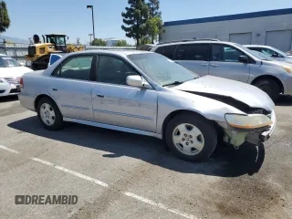 2002 Honda Accord EX z VIN 1HGCG16582A001090, wystawiony jako Copart lot #58244785 z przebiegiem 99 158 mil mil oraz Szkoda całkowita • Salvage title. Historia ofert i sprzedaży dostępna na DreamBid. Obrazek 4.