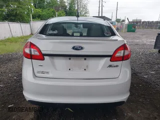 2011 Ford Fiesta SE z VIN 3FADP4BJ5BM207676, wystawiony jako IAAI lot #42263307 z przebiegiem 139 929 mil mil oraz . Historia ofert i sprzedaży dostępna na DreamBid. Obrazek 16.