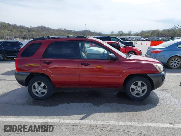 2007 Kia Sportage LX with VIN KNDJF724577371572, listed as a IAAI auction lot 41817960 with 213,062 mi miles. Bid and sale history available at carsss.com. Image 13.