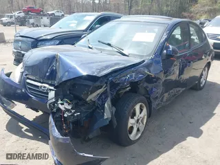2009 Hyundai Elantra SE with VIN KMHDU46D79U818575, listed as a IAAI auction lot 42075991 with 215,096 mi miles. Bid and sale history available at carsss.com. Image 2.