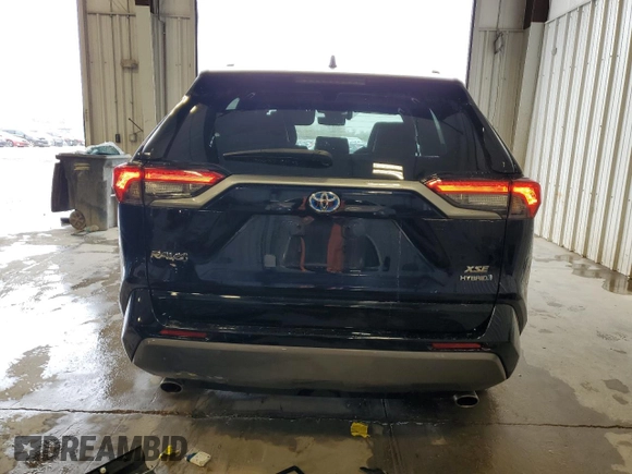 2021 Toyota RAV4 Hybrid XSE with VIN 2T3E6RFV7MW009954, listed as a Copart auction lot 54954425 with 61,397 mi miles and Salvage title. Bid and sale history available at DreamBid. Image 6.