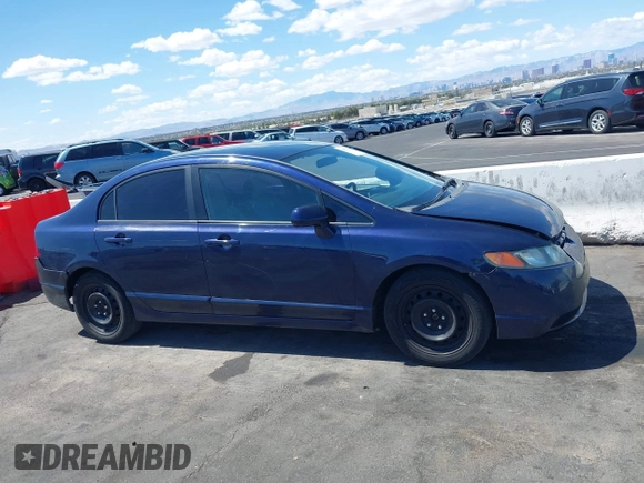 2006 Honda Civic LX with VIN 1HGFA16576L082141, listed as a IAAI auction lot 41970246 with 172,178 mi miles and . Bid and sale history available at DreamBid. Image 13.