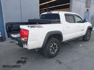 2017 Toyota Tacoma SR5 with VIN 3TMAZ5CN2HM045318, listed as a IAAI auction lot 41824555 with 80,918 mi miles. Bid and sale history available at carsss.com. Image 4.
