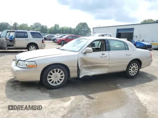 2003 Lincoln Town Car Executive z VIN 1LNHM81W03Y620258, wystawiony jako Copart lot #58485775 z przebiegiem 95 706 mil mil oraz Szkoda całkowita • Salvage title. Historia ofert i sprzedaży dostępna na DreamBid. Obrazek 1.