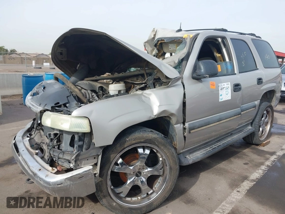2004 Chevrolet Tahoe LT z VIN 1GNEC13ZX4R131734, wystawiony jako IAAI lot #40971315 z przebiegiem Nie podano mil oraz . Historia ofert i sprzedaży dostępna na DreamBid. Obrazek 2.
