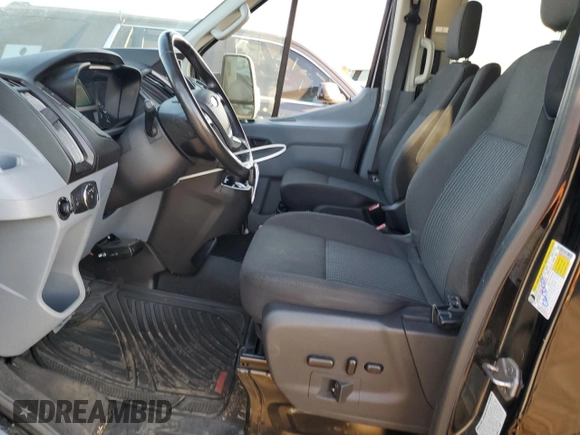 2018 Ford Transit Passenger XL with VIN 1FBVU4XG3JKA28907, listed as a Copart auction lot 69424444 with 61,411 mi miles and Salvage Title. Bid and sale history available at DreamBid. Image 7.