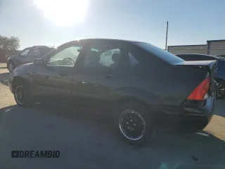 2000 Ford Focus LX with VIN 1FAFP33P8YW216936, listed as a Copart auction lot 83038404 with 120,298 mi miles and Salvage Title. Bid and sale history available at DreamBid. Image 2.