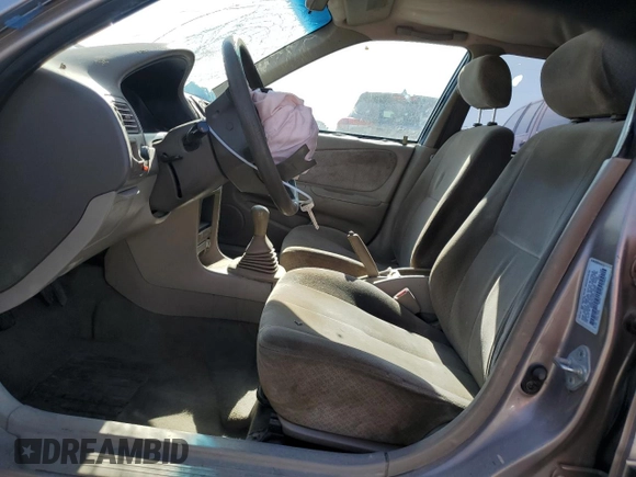 1999 Toyota Corolla VE with VIN 1NXBR12E9XZ158252, listed as a Copart auction lot 58757595 with 232,776 mi miles and Salvage title. Bid and sale history available at DreamBid. Image 7.
