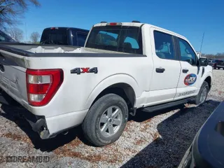 2021 Ford F-150 XL with VIN 1FTEW1EP7MKE32689, listed as a IAAI auction lot 35583709 with 33,070 mi miles. Bid and sale history available at carsss.com. Image 4.