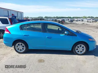 2010 Honda Insight EX with VIN JHMZE2H74AS013148, listed as a IAAI auction lot 42194894 with 114,885 mi miles and . Bid and sale history available at DreamBid. Image 14.