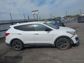 2014 Hyundai Santa Fe z VIN 5XYZTDLB1EG197765, wystawiony jako IAAI lot #41999374 z przebiegiem 172 430 mil mil oraz . Historia ofert i sprzedaży dostępna na DreamBid. Obrazek 13.