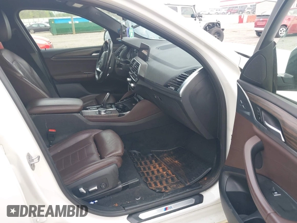 2019 BMW X4 xDrive30i with VIN 5UXUJ3C52KLG54945, listed as a IAAI auction lot 42083434 with 153,956 mi miles and . Bid and sale history available at DreamBid. Image 5.