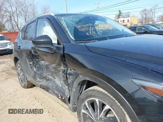 2023 Mazda CX-5 S Premium with VIN JM3KFBDM7P0201038, listed as a IAAI auction lot 41772989 with 26,227 mi miles and . Bid and sale history available at DreamBid. Image 6.