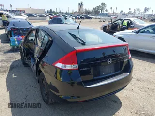 2010 Honda Insight LX with VIN JHMZE2H50AS014165, listed as a IAAI auction lot 42381535 with 169,032 mi miles and . Bid and sale history available at DreamBid. Image 3.