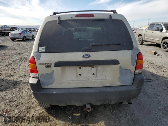 2003 Ford Escape XLT Popular 2 with VIN 1FMYU93143KC64939, listed as a Copart auction lot 75284884 with 147,352 mi miles and Salvage Title. Bid and sale history available at carsss.com. Image 6.