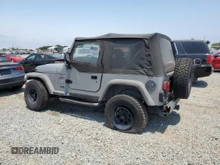 2001 Jeep Wrangler Sport с VIN 1J4FA49S41P353878, выставлен на аукционе Copart как лот 64637385 с пробегом 166 642 миль миль и Списание • Salvage title. История ставок и продаж доступна на DreamBid. Изображение 2.