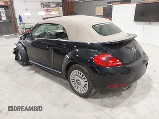 2014 Volkswagen Beetle 1.8T с VIN 3VW517AT5EM818796, выставлен на аукционе IAAI как лот 42318653 с пробегом 150 443 миль миль и . История ставок и продаж доступна на DreamBid. Изображение 3.