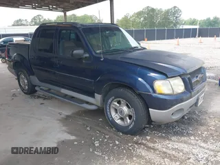 2003 Ford Explorer Sport Trac XLS z VIN 1FMZU67E33UB04832, wystawiony jako IAAI lot #42309055 z przebiegiem 149 360 mil mil oraz . Historia ofert i sprzedaży dostępna na DreamBid. Obrazek 1.