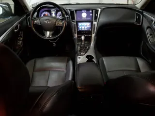 2015 Infiniti Q50 Premium with VIN JN1BV7AP8FM337048, listed as a Copart auction lot 83052064 with 128,640 mi miles and Salvage Title. Bid and sale history available at carsss.com. Image 8.