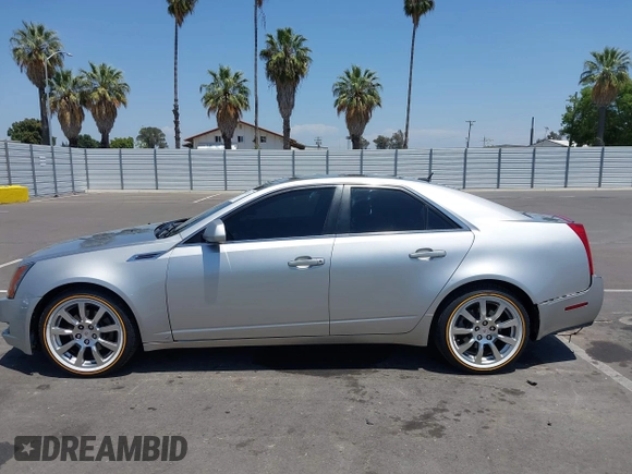2008 Cadillac CTS RWD z VIN 1G6DV57V880153063, wystawiony jako IAAI lot #42440277 z przebiegiem 158 312 mil mil oraz . Historia ofert i sprzedaży dostępna na DreamBid. Obrazek 14.