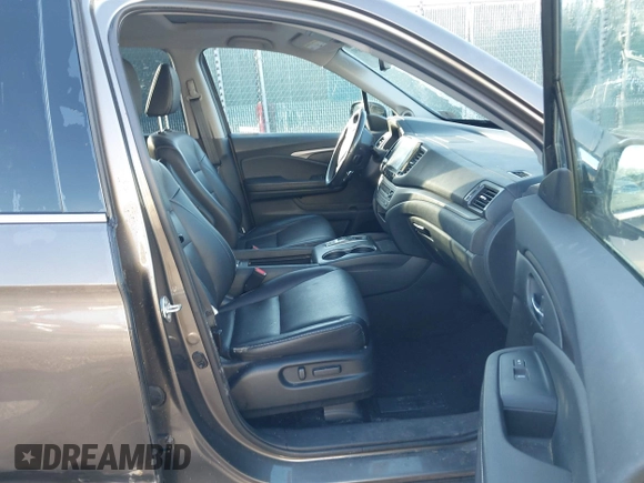 2022 Honda Ridgeline RTL-E with VIN 5FPYK3F79NB005152, listed as a IAAI auction lot 41754891 with 60,191 mi miles and . Bid and sale history available at DreamBid. Image 5.