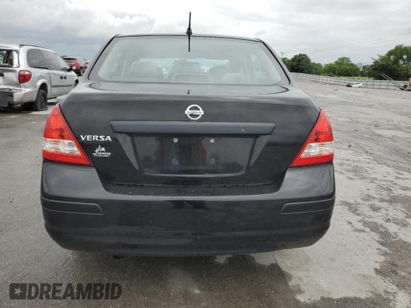 2009 Nissan Versa 1.6 z VIN 3N1CC11EX9L465053, wystawiony jako Copart lot #58202265 z przebiegiem 212 058 mil mil oraz Szkoda całkowita • Salvage title. Historia ofert i sprzedaży dostępna na DreamBid. Obrazek 6.