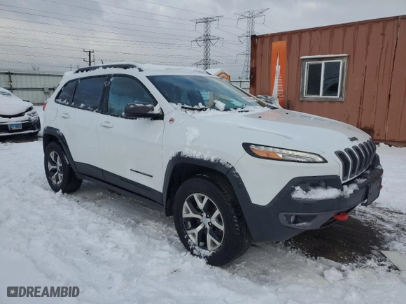 2015 Jeep Cherokee Trailhawk with VIN 1C4PJMBS5FW522341, listed as a Copart auction lot 85594264 with 86,918 mi miles and Salvage Title. Bid and sale history available at carsss.com. Image 4.