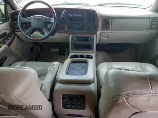 2004 GMC Yukon SLT z VIN 1GKEC13ZX4R203707, wystawiony jako Copart lot #56866075 z przebiegiem Nie podano mil oraz Szkoda całkowita • Salvage title. Historia ofert i sprzedaży dostępna na DreamBid. Obrazek 8.