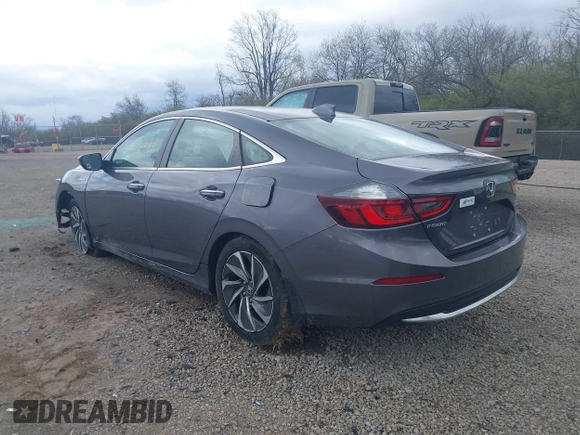 2021 Honda Insight Touring with VIN 19XZE4F91ME005517, listed as a IAAI auction lot 42036493 with 65,404 mi miles and . Bid and sale history available at carsss.com. Image 3.