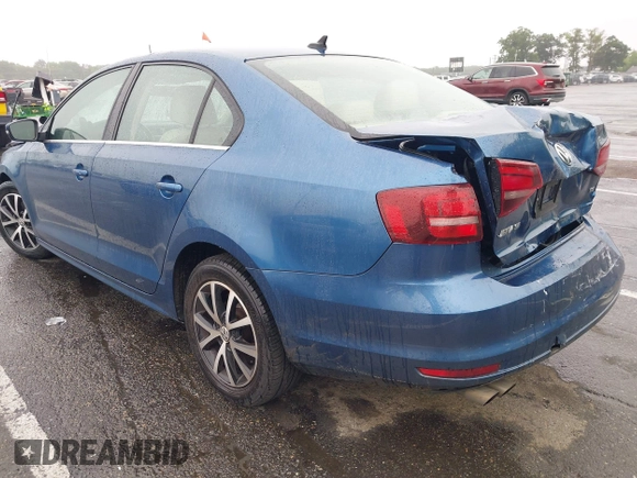 2017 Volkswagen Jetta SE with VIN 3VWDB7AJ0HM293674, listed as a IAAI auction lot 42457531 with 74,109 mi miles and . Bid and sale history available at DreamBid. Image 3.