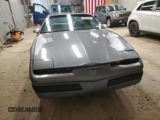 1990 Pontiac Firebird z VIN 1G2FS23T2LL200780, wystawiony jako Copart lot #50364665 z przebiegiem 101 108 mil mil oraz Czysty tytuł • Clean title. Historia ofert i sprzedaży dostępna na DreamBid. Obrazek 5.