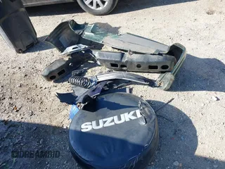 2001 Suzuki Vitara JX z VIN 2S3TD52V416109787, wystawiony jako IAAI lot #42126699 z przebiegiem Nie podano mil oraz . Historia ofert i sprzedaży dostępna na DreamBid. Obrazek 11.