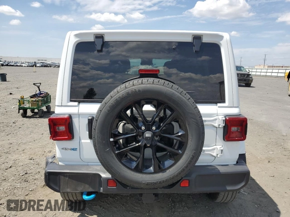 2024 Jeep Wrangler Sahara с VIN 1C4RJXP62RW275130, выставлен на аукционе Copart как лот 62665895 с пробегом 21 521 миль миль и На запчасти • Non repairable. История ставок и продаж доступна на DreamBid. Изображение 6.