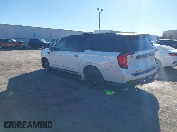 2021 GMC Yukon XL Denali with VIN 1GKS2JKT1MR401207, listed as a IAAI auction lot 41242619 with 87,902 mi miles and . Bid and sale history available at carsss.com. Image 3.