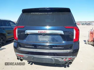 2021 GMC Yukon Denali with VIN 1GKS2DKL1MR135771, listed as a IAAI auction lot 41403680 with 61,772 mi miles. Bid and sale history available at carsss.com. Image 16.