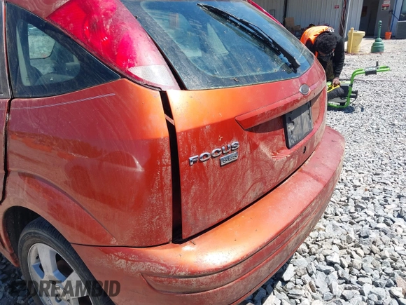 2005 Ford Focus S with VIN 3FAFP37N85R113281, listed as a IAAI auction lot 42037187 with Not Provided miles and . Bid and sale history available at carsss.com. Image 12.