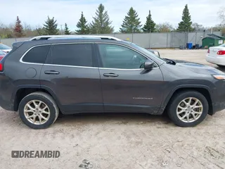 2015 Jeep Cherokee Latitude with VIN 1C4PJLCS9FW542181, listed as a IAAI auction lot 42183167 with 144,607 mi miles and . Bid and sale history available at carsss.com. Image 13.