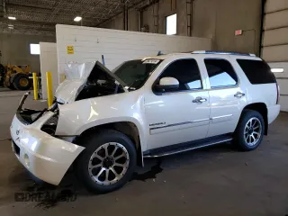 2012 GMC Yukon Denali with VIN 1GKS2EEF3CR140772, listed as a Copart auction lot 69621614 with 207,425 mi miles and Salvage Title. Bid and sale history available at carsss.com. Image 1.