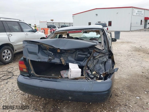 2002 Saturn SL with VIN 1G8ZH52852Z270057, listed as a IAAI auction lot 41816011 with 314,884 mi miles. Bid and sale history available at carsss.com. Image 6.