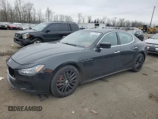 2014 Maserati Ghibli S Q4 z VIN ZAM57RTA3E1089652, wystawiony jako Copart lot #42714205 z przebiegiem 89 346 mil mil oraz Szkody całkowita. Historia ofert i sprzedaży dostępna na DreamBid. Obrazek 1.