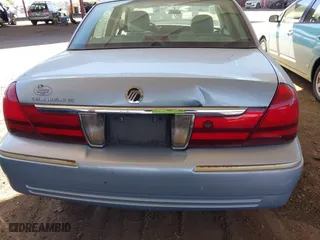 2004 Mercury Grand Marquis GS with VIN 2MEFM74W24X690149, listed as a IAAI auction lot 41842464 with 118,776 mi miles. Bid and sale history available at carsss.com. Image 6.