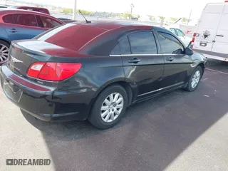 2010 Chrysler Sebring Touring with VIN 1C3CC4FB5AN219937, listed as a IAAI auction lot 41981869 with 147,599 mi miles. Bid and sale history available at carsss.com. Image 4.