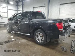 2015 Nissan Titan SV with VIN 1N6AA0EC9FN510828, listed as a Copart auction lot 43855205 with 63,512 mi miles and Salvage title. Bid and sale history available at DreamBid. Image 2.